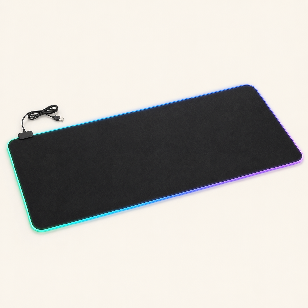 Plain black RGB LED desk mat with illuminated edge, controller and USB cable on a warm off-white background