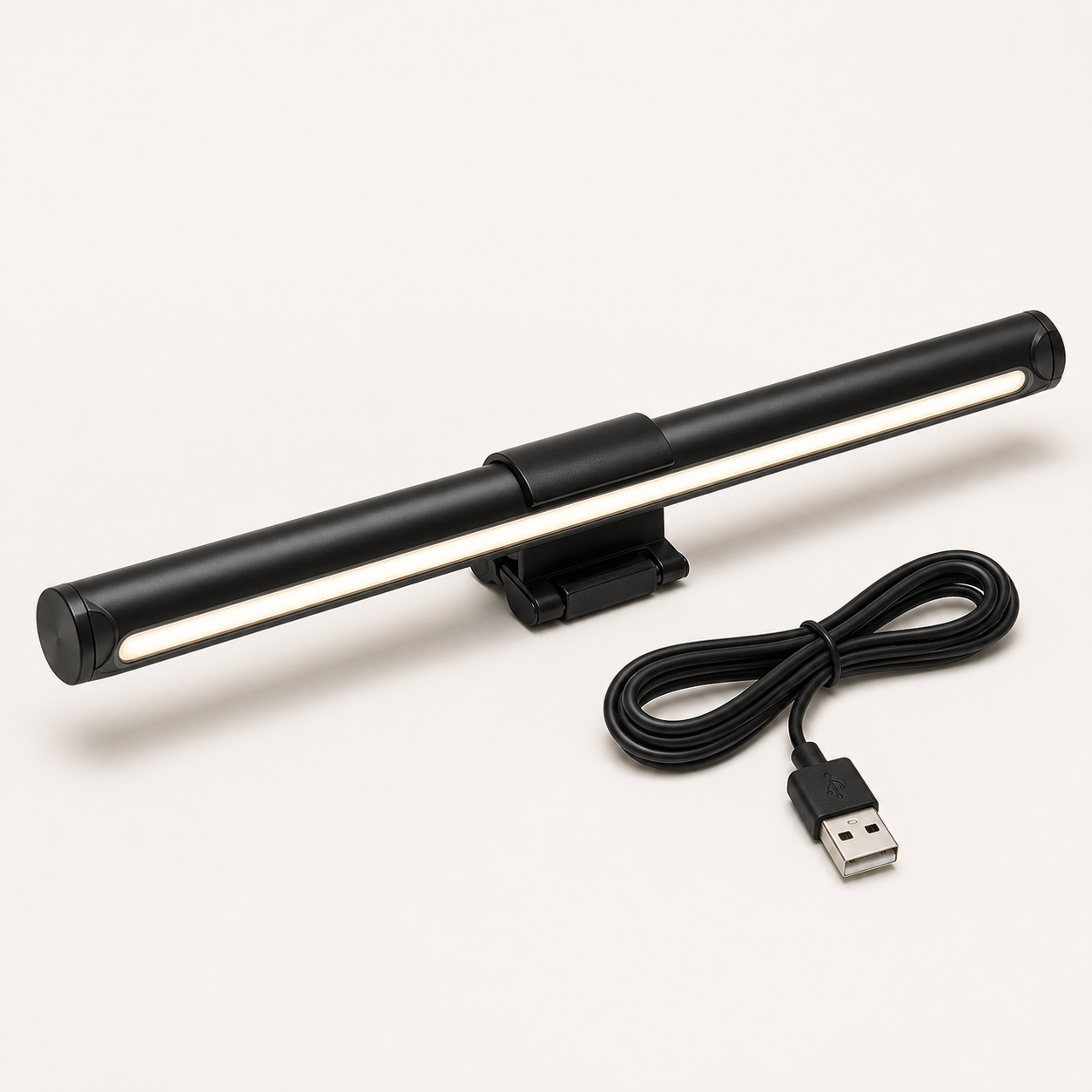 Black USB monitor task light with front white LEDs, clip, and cable on a square off-white background